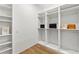 Spacious walk-in closet with ample shelving and hanging space at 703 W Plymouth St, Tampa, FL 33603