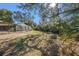 Backyard oasis with canal view and patio seating at 7108 Riverwood Blvd, Tampa, FL 33615
