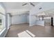 Bright living room with vaulted ceilings and tile flooring at 7108 Riverwood Blvd, Tampa, FL 33615