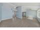 Spacious living room with high ceilings, recessed lighting and neutral tones at 7108 Riverwood Blvd, Tampa, FL 33615