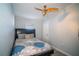 Bright bedroom with a comfortable bed and ceiling fan at 8346 Fantasia Park Way, Riverview, FL 33578