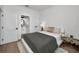 Bright bedroom with a queen-size bed and ensuite bathroom at 946 Highland Ave # 65, Dunedin, FL 34698