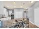 Kitchen island with granite countertop and seating for two at 959 Melrose S Ave, St Petersburg, FL 33705