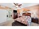 Bright bedroom with a queen-size bed and ensuite bathroom access at 960 Starkey Rd # 5406, Largo, FL 33771