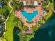 Community pool and lakefront views from above at 10263 Gandy N Blvd # 202, St Petersburg, FL 33702