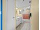 Clean bathroom with updated vanity and flooring at 10263 Gandy N Blvd # 202, St Petersburg, FL 33702