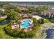 Community pool and spa area with surrounding landscaping at 10263 Gandy N Blvd # 202, St Petersburg, FL 33702