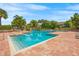 Inviting community pool with plenty of lounge chairs at 10263 Gandy N Blvd # 202, St Petersburg, FL 33702