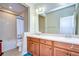 Bathroom with double sinks, bathtub, and shower at 11807 Cross Vine Dr, Riverview, FL 33579