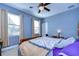 Bedroom with double bed and window views at 11807 Cross Vine Dr, Riverview, FL 33579