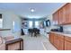 Spacious bonus room with piano, built-in cabinetry and whiteboard at 11807 Cross Vine Dr, Riverview, FL 33579