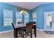 Bright breakfast nook with table and chairs near sliding door at 11807 Cross Vine Dr, Riverview, FL 33579