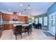 Modern kitchen with granite countertops and stainless steel appliances at 11807 Cross Vine Dr, Riverview, FL 33579