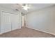 Bedroom with ceiling fan and access to another room at 16207 59Th E Ct, Parrish, FL 34219