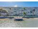 Private waterfront dock with seating for residents at 1847 Shore S Dr # 509, South Pasadena, FL 33707