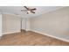 Bright bedroom with hardwood floors and access to bathroom at 19029 Us Highway 19 N # 32F, Clearwater, FL 33764