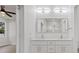 Double vanity bathroom with modern finishes at 200 W Kirby St, Tampa, FL 33604