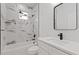 Bathroom with marble shower and modern vanity at 200 W Kirby St, Tampa, FL 33604