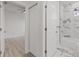 View of bathroom and bedroom with white doors at 200 W Kirby St, Tampa, FL 33604