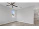 Spacious bedroom with wood-look floors and a ceiling fan at 200 W Kirby St, Tampa, FL 33604