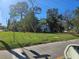 Single story house on Sunset Way with a large yard at 234 Ridge Rd, Palm Harbor, FL 34683