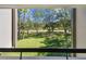 Peaceful balcony view of trees and green space at 36750 Us Highway 19 N # 19219, Palm Harbor, FL 34684