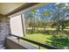 Serene balcony view of golf course and trees at 36750 Us Highway 19 N # 19219, Palm Harbor, FL 34684