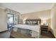 Spacious bedroom with king bed and access to a private balcony at 36750 Us Highway 19 N # 19219, Palm Harbor, FL 34684