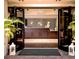 Spa reception area featuring a modern wooden desk and comfortable seating at 36750 Us Highway 19 N # 19219, Palm Harbor, FL 34684