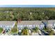 Aerial view of townhouses, highlighting property location at 4445 Amberly Oaks Ct, Tampa, FL 33614