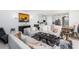 Open living space with kitchen and dining area views, comfortable seating, and modern accents at 4445 Amberly Oaks Ct, Tampa, FL 33614