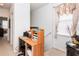 Convenient home office space with a workspace and built-in shelving at 4445 Amberly Oaks Ct, Tampa, FL 33614