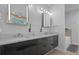 Modern bathroom boasting double sinks and sleek cabinetry at 5204 Fern Row Ln, Tampa, FL 33611