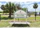 Sign for Apollo Beach Dog Park with address and details at 6000 Francis Drive, Apollo Beach, FL 33572