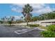 Designated guest parking area with lush landscaping at 6361 Bahia Del Mar Blvd # 605, St Petersburg, FL 33715