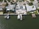 Aerial view of a house under construction on a canal at 6457 1St Palm Pt, St Pete Beach, FL 33706