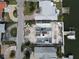 Aerial view of a house under construction near the water at 6457 1St Palm Pt, St Pete Beach, FL 33706