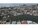 Aerial view of waterfront homes and neighborhood at 6457 1St Palm Pt, St Pete Beach, FL 33706