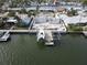 Aerial view of a house under construction next to the water at 6457 1St Palm Pt, St Pete Beach, FL 33706