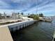 New seawall and a house under construction next to a canal at 6457 1St Palm Pt, St Pete Beach, FL 33706