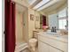 Bathroom with shower, toilet, and vanity with a mirror at 6600 121St Ave # 9, Largo, FL 33773