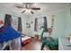 bedroom with wood floors, playful decor, and ample natural light at 7201 Park S St, St Petersburg, FL 33707