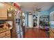 View of kitchen with stainless steel appliances and ample cabinet space at 7201 Park S St, St Petersburg, FL 33707