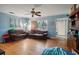 Bright living room with hardwood floors and a view of the backyard at 7201 Park S St, St Petersburg, FL 33707