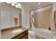 Bathroom with tub, shower, and granite vanity at 10439 Waterstone Dr, Riverview, FL 33578