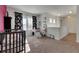 Bedroom with crib, desk, and window with curtains at 10439 Waterstone Dr, Riverview, FL 33578