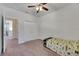 Cozy bedroom with carpet flooring and double door closet at 10439 Waterstone Dr, Riverview, FL 33578