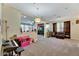 Bright Gathering room with open floor plan, view to living area at 10439 Waterstone Dr, Riverview, FL 33578