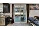 Kitchen with sliding door leading to backyard, breakfast nook, and dark wood cabinets at 10439 Waterstone Dr, Riverview, FL 33578