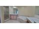 Bathroom with soaking tub, walk-in shower, and double vanity at 10851 Mangrove Cay Ne Ln # 1112, St Petersburg, FL 33716